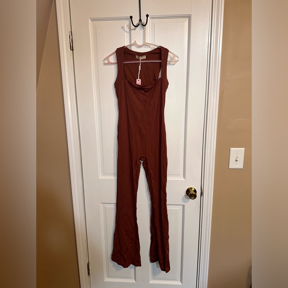 Tank top body suit/jumpsuit. Burnt orange color. Never worn.